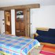 Living area with kitchenette at the apartment Punta Rossa in Cogne
