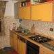 Kitchen in apartment Desaymonet in Cogne